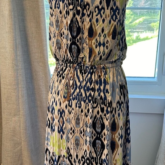 Lightweight material great dress with asymmetrical hemline. Gently used. - Picture 2 of 4